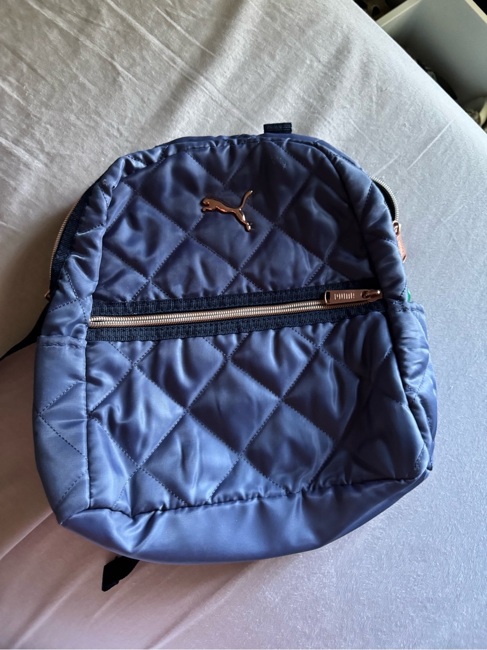 PUMA Quilted Navy Blue Mini Backpack with Gold Accent